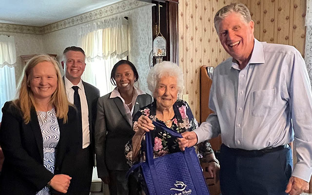R.I. Gov. Daniel J. McKee Delivers Meals on Wheels of RI 20-Millionth Home-Delivered Meal 9 governor delivering meal